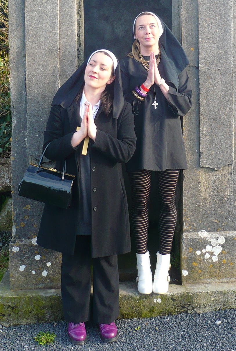 Two Nuns wearing Black Opaque Pantyhose and Black Pants